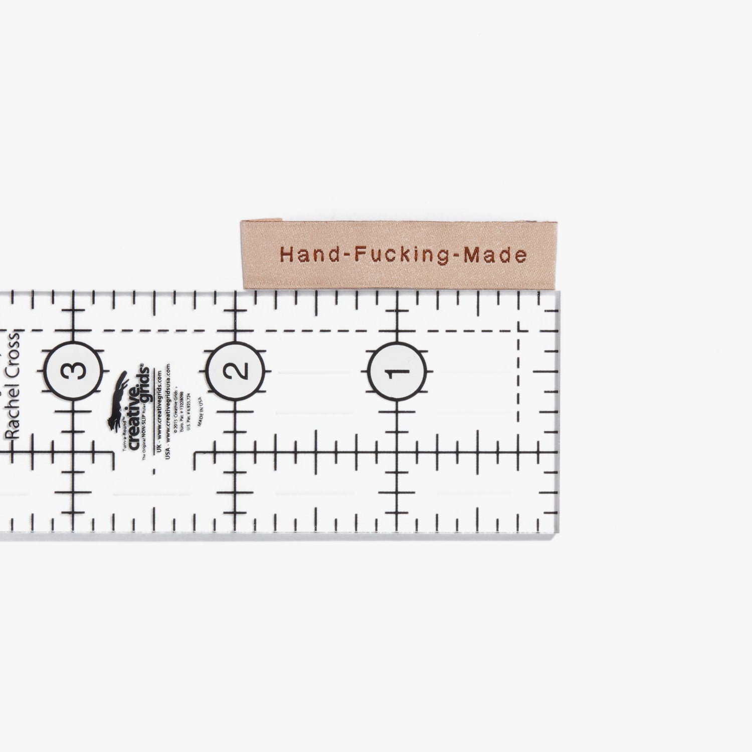 'Hand F*cking Made' labels