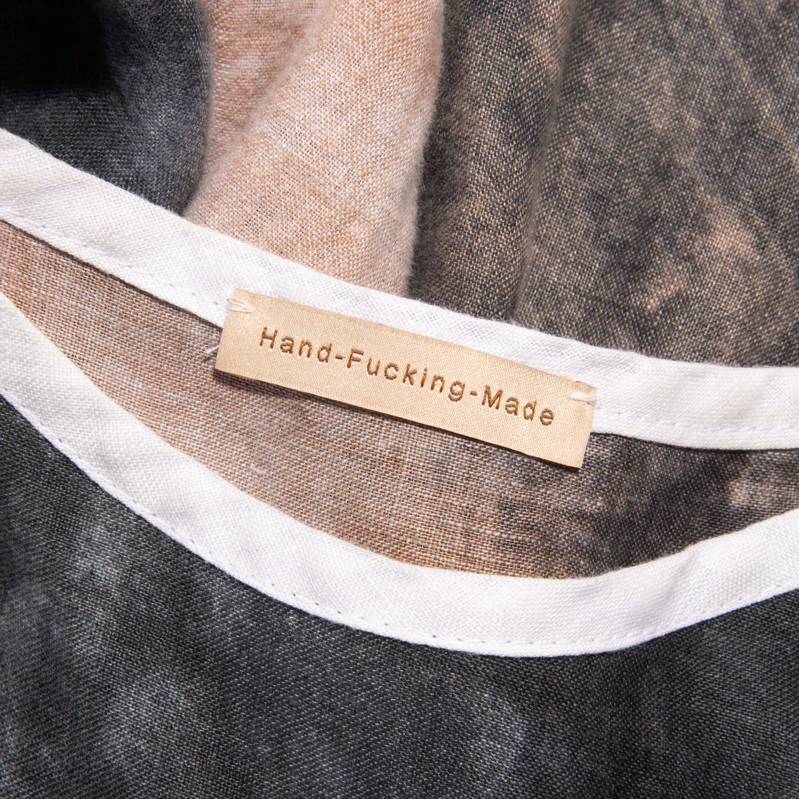 'Hand F*cking Made' labels